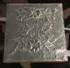 Box Embossed aluminum on wood 